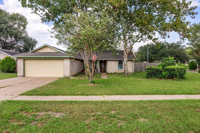 ranch-style house with a front yard and a garage