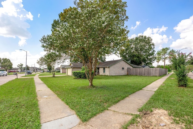 exterior space featuring a front lawn