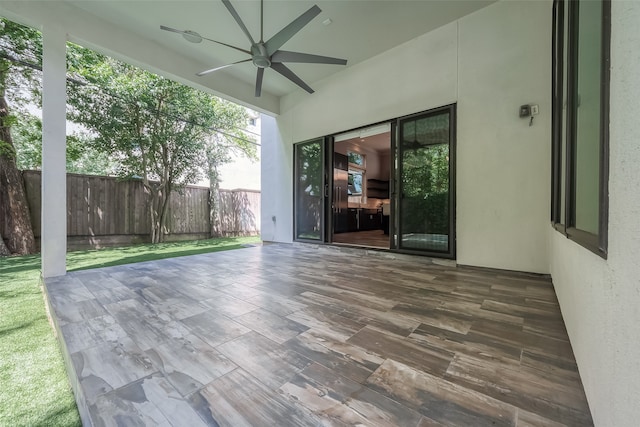 view of patio / terrace featuring ceiling fan