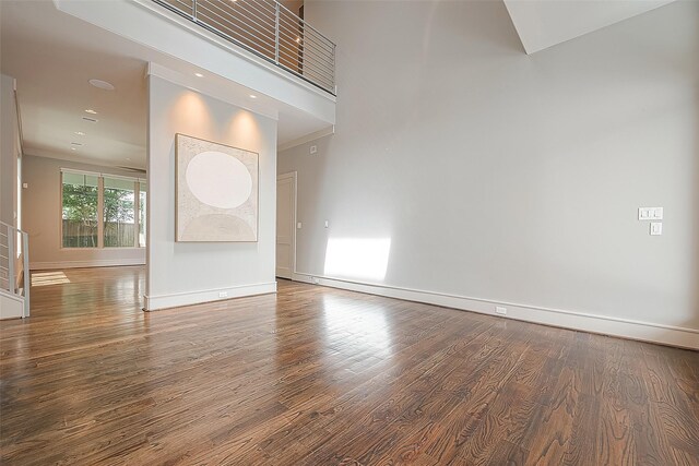 spare room with wood-type flooring