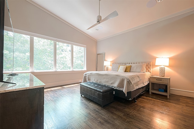 bedroom with ceiling fan, dark hardwood / wood-style floors, and high vaulted ceiling