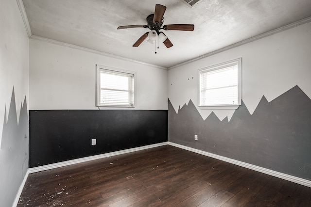 empty room featuring ornamental molding, dark hardwood / wood-style floors, and ceiling fan