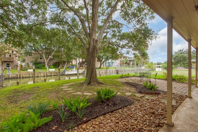 view of yard with a water view