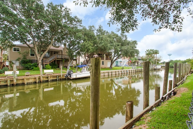 view of dock featuring a deck with water view