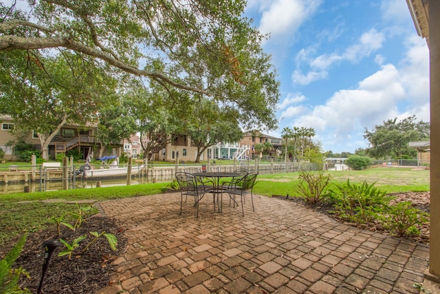 view of patio / terrace featuring a water view