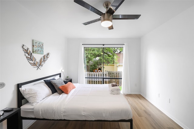 bedroom featuring light wood-type flooring and ceiling fan