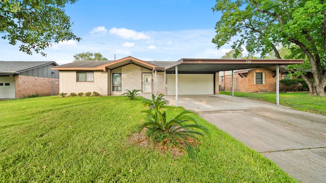 ranch-style home with a carport, a garage, and a front yard