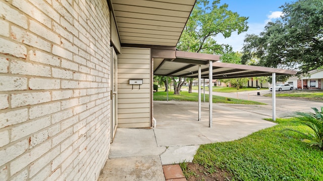 view of patio / terrace featuring a carport