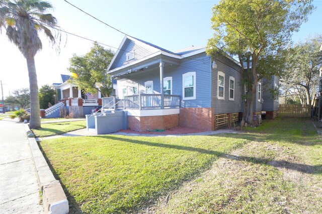 view of home's exterior featuring a yard