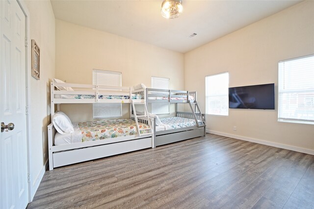 unfurnished bedroom featuring wood-type flooring