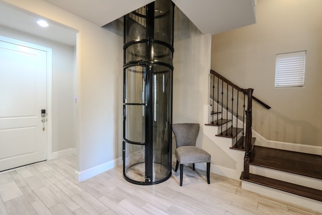 interior space with hardwood / wood-style floors