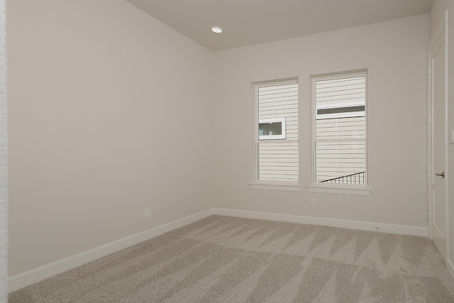 unfurnished room with carpet floors