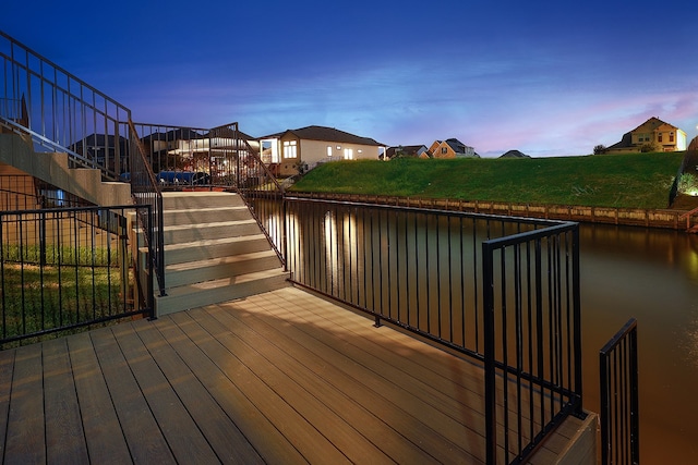 deck at dusk with a water view