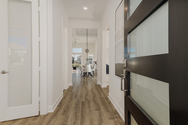 hallway featuring hardwood / wood-style floors