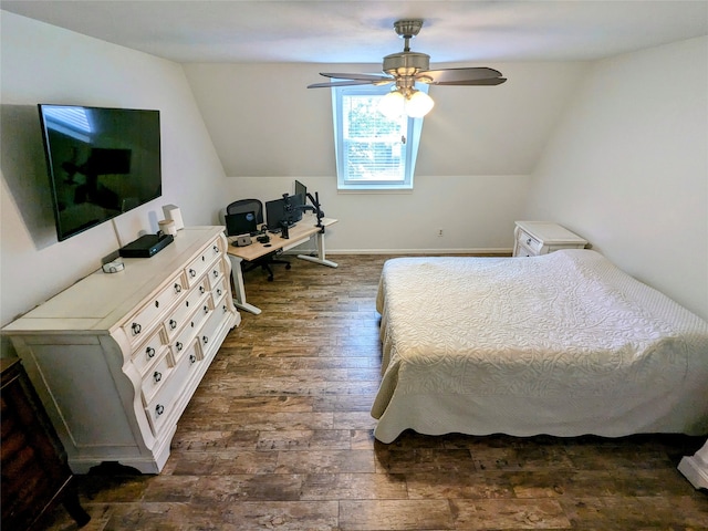 bedroom with lofted ceiling, ceiling fan, and dark hardwood / wood-style flooring