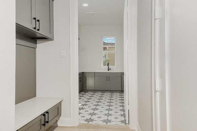 mudroom featuring sink