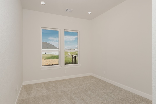 view of carpeted spare room