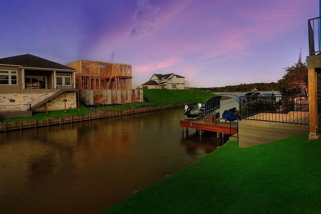 dock area featuring a water view