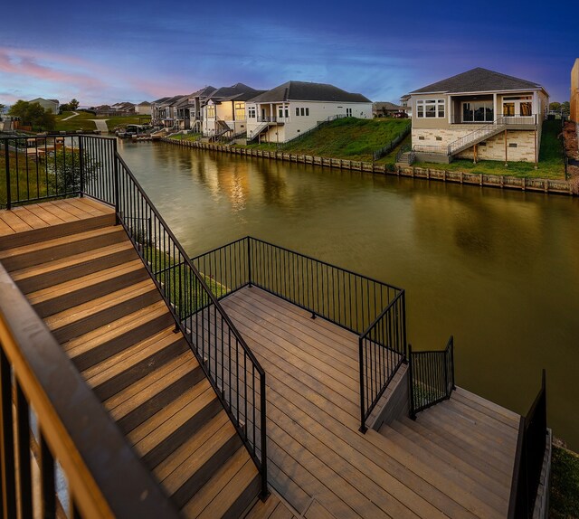 dock area with a water view