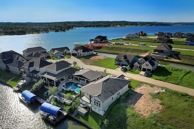 bird's eye view with a water view