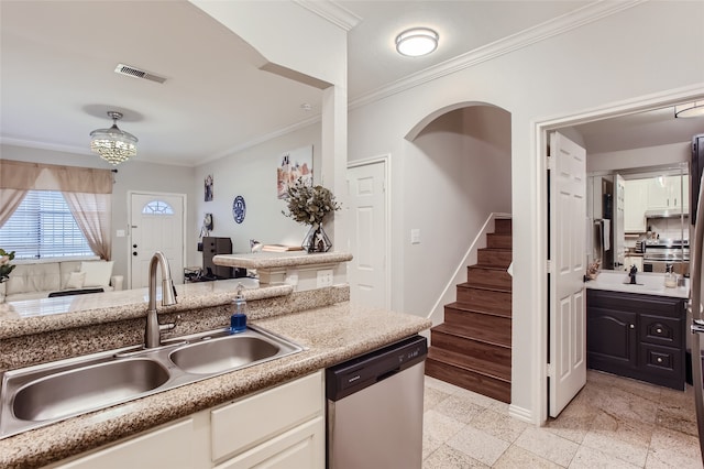 kitchen featuring stainless steel dishwasher, ornamental molding, sink, and white cabinetry