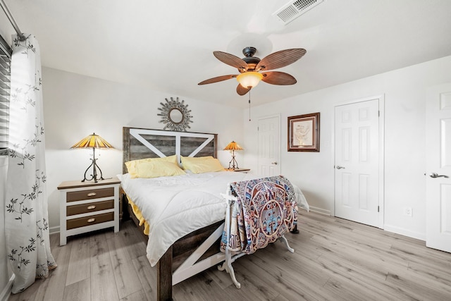 bedroom featuring ceiling fan and light hardwood / wood-style flooring