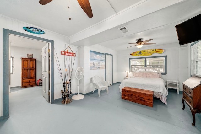 bedroom featuring concrete flooring and ceiling fan