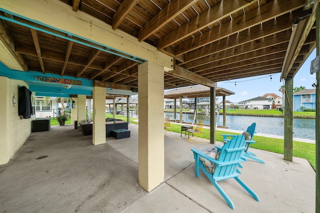 view of patio / terrace with a water view