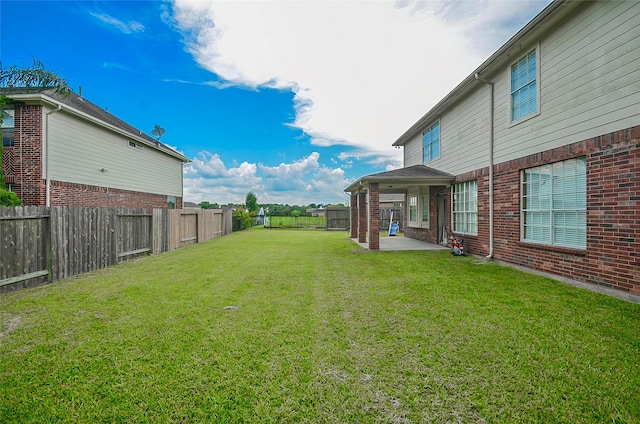 view of yard featuring a patio