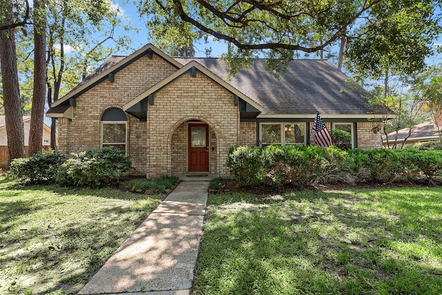 view of front of property with a front lawn