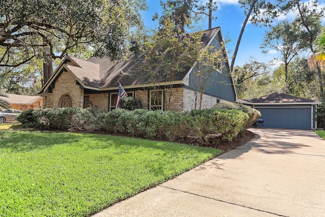 view of front property with a garage and a front yard