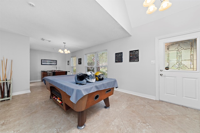 game room with billiards, a chandelier, and lofted ceiling