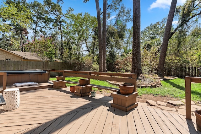 deck with a hot tub