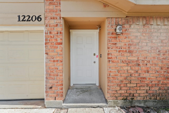 entrance to property with a garage