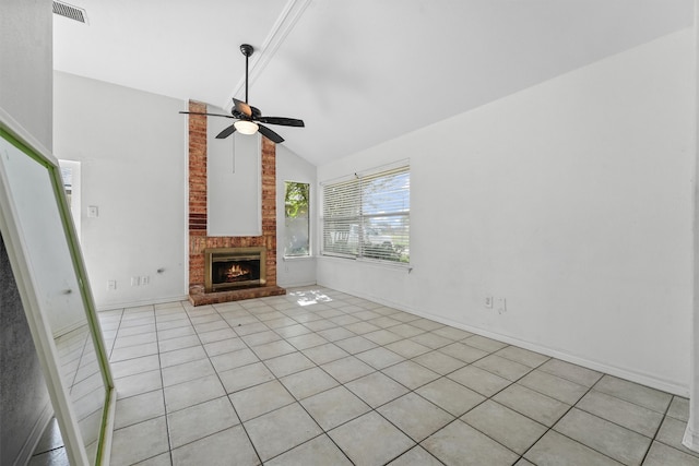 unfurnished living room with a fireplace, light tile patterned flooring, lofted ceiling, and ceiling fan