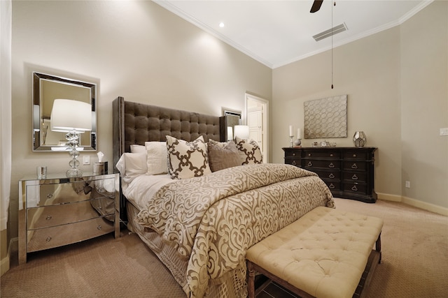 carpeted bedroom with ceiling fan and crown molding