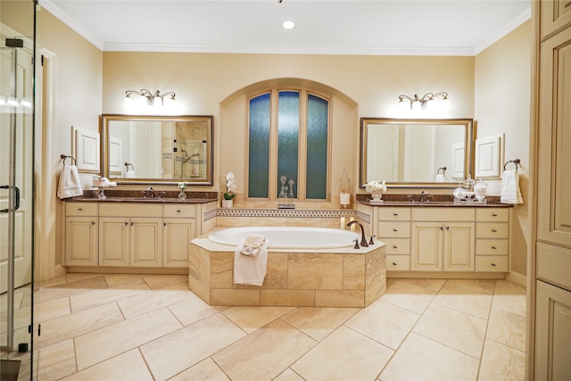 bathroom with ornamental molding, vanity, and separate shower and tub