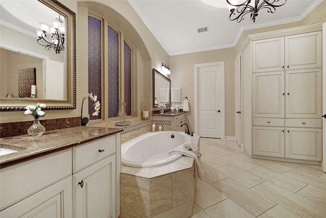 bathroom featuring vanity, tiled bath, crown molding, and a chandelier