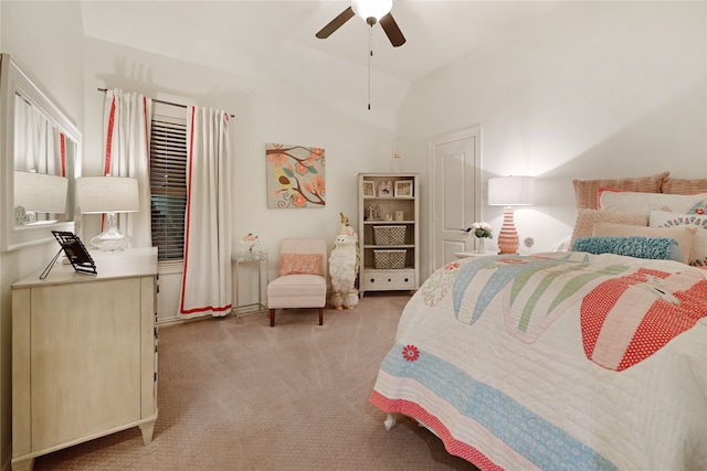 bedroom with ceiling fan, light carpet, and vaulted ceiling