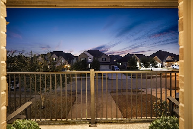 view of gate at dusk