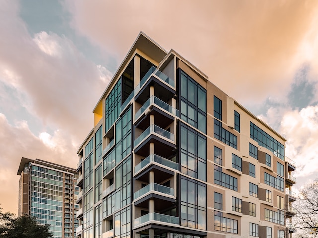 view of outdoor building at dusk