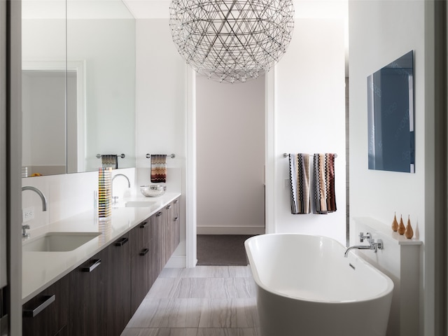 bathroom featuring vanity and a bathing tub