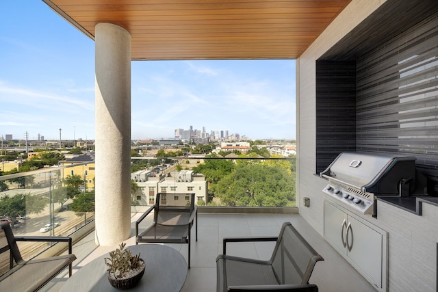 balcony featuring area for grilling