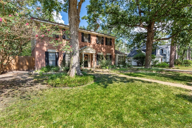 view of front of home with a front yard