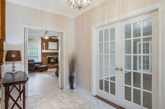 hallway with french doors, light tile patterned floors, crown molding, and a notable chandelier