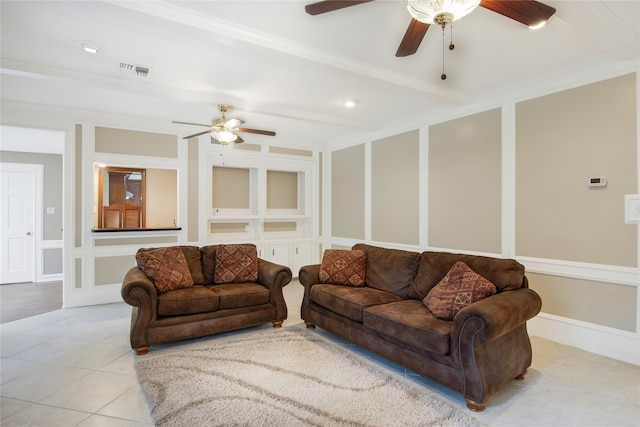 tiled living room featuring crown molding and ceiling fan