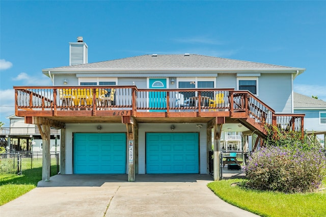 exterior space featuring a deck and a garage