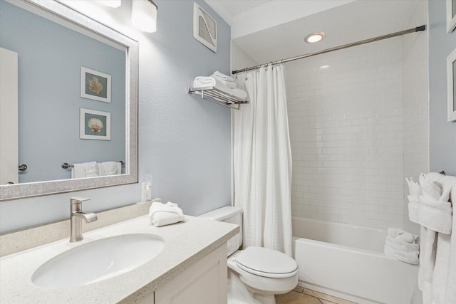 full bathroom with vanity, shower / tub combo, and toilet