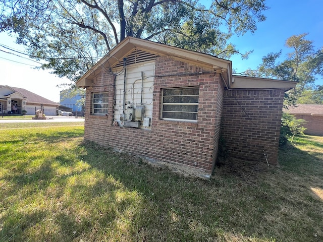 view of home's exterior featuring a lawn