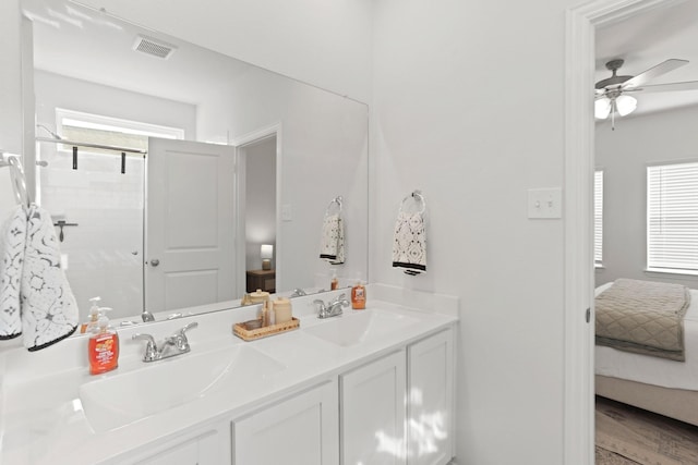 bathroom with vanity and ceiling fan